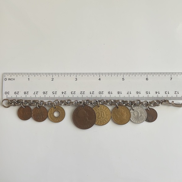 Vintage coin charm bracelet with various European coins on a silver tone chain - Picture 11 of 12